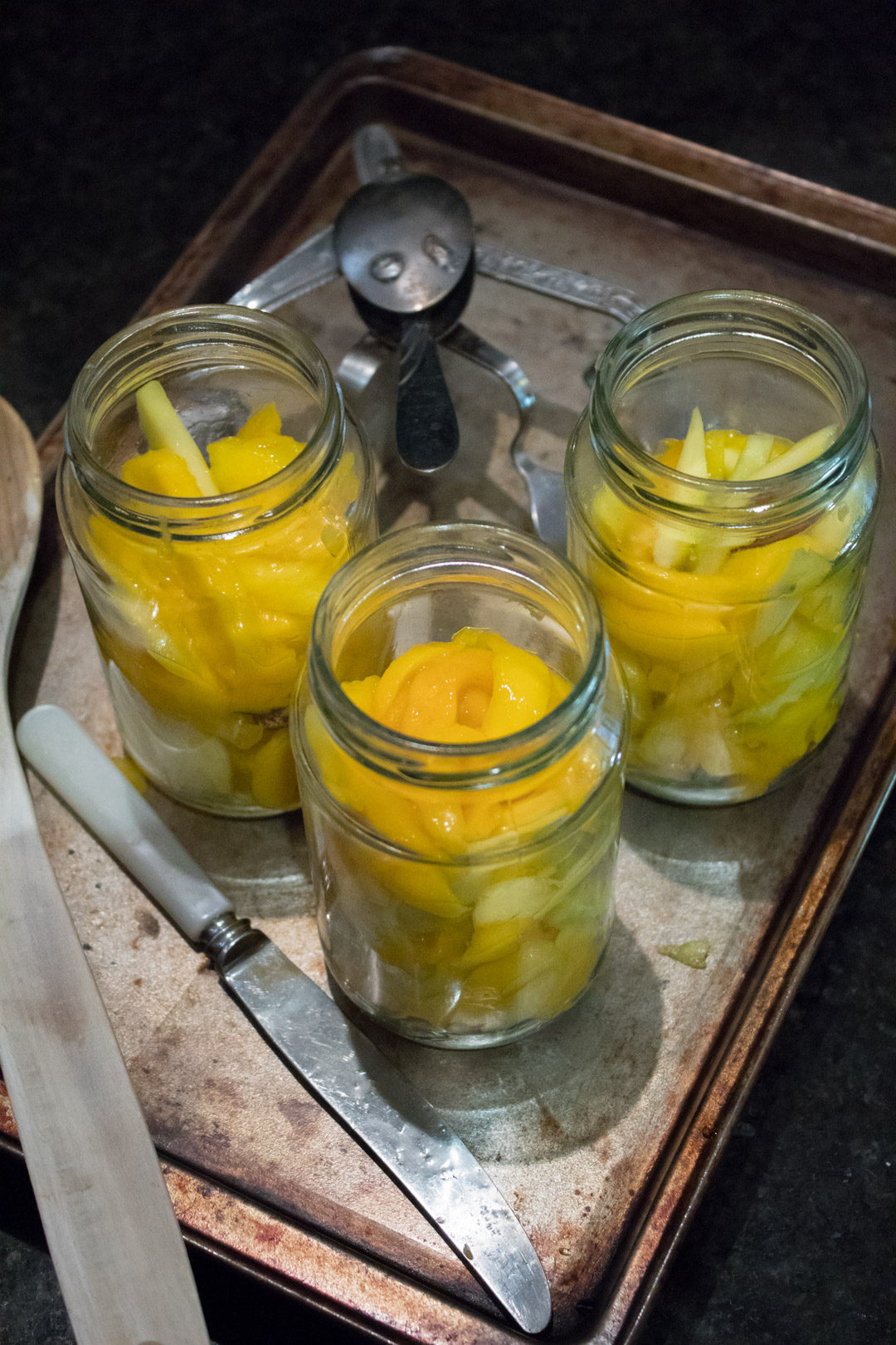 green mango pickle in jars