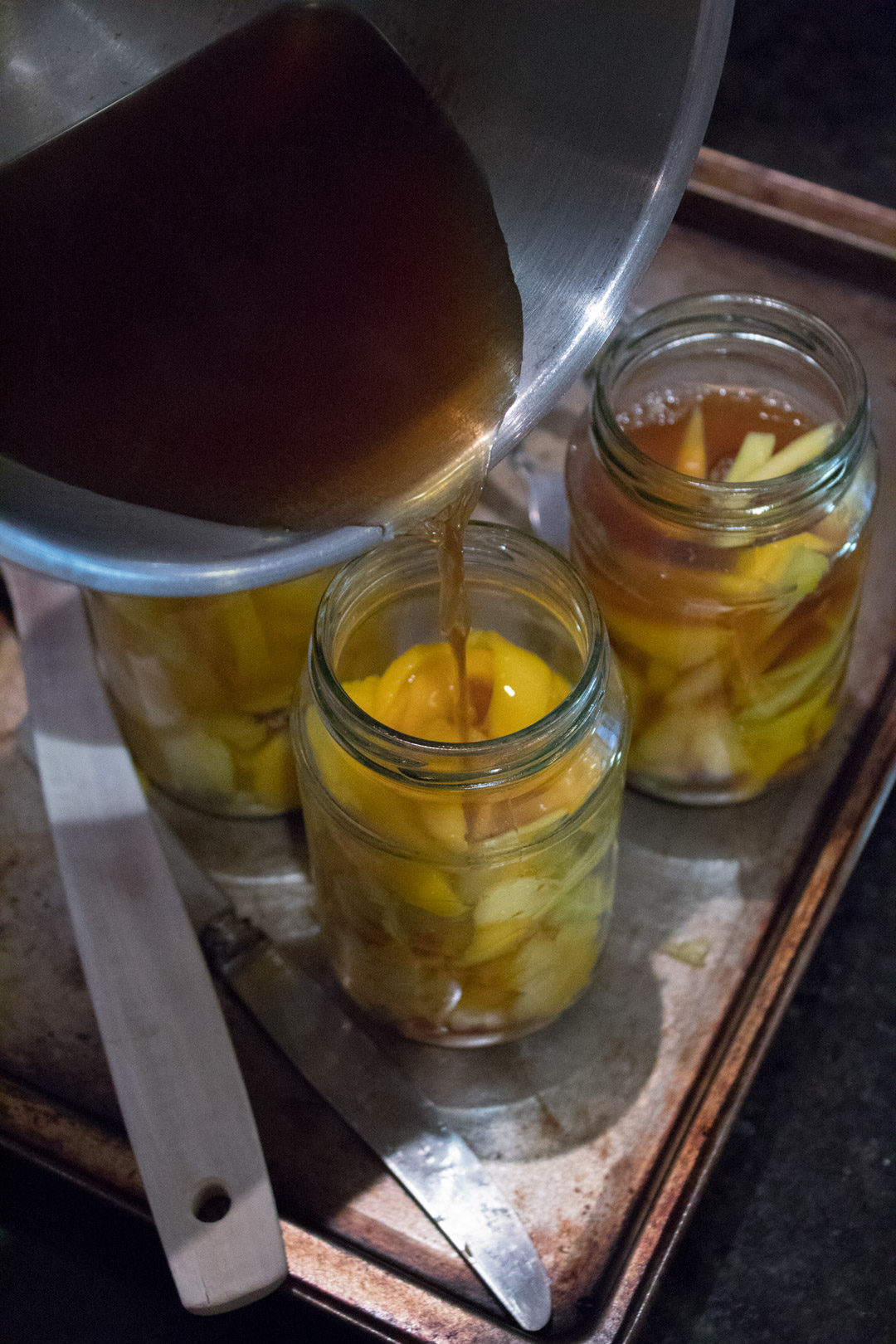 green mango pickle vinegar pour