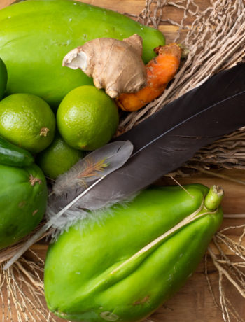 green papayas with lime, chili, ginger, turmeric