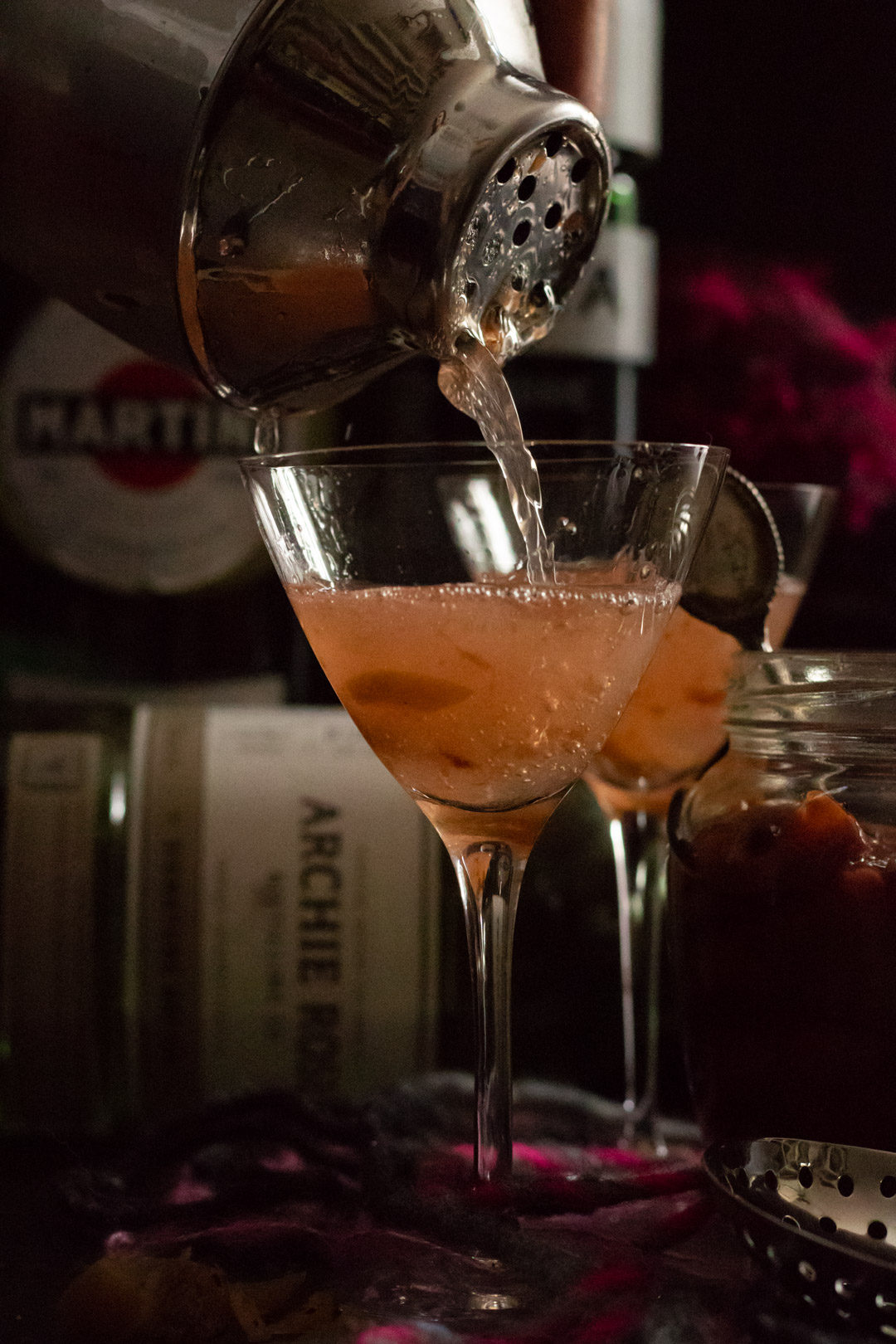 pouring a dirty pickled plum & ume martini
