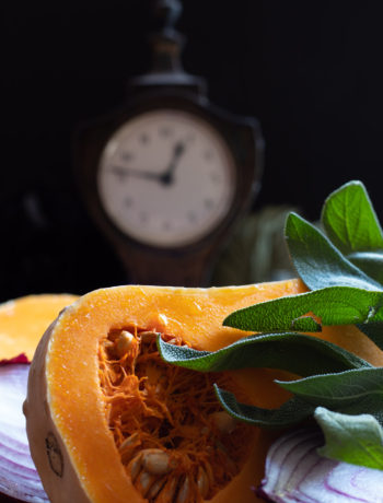 cut pumpkin with clock