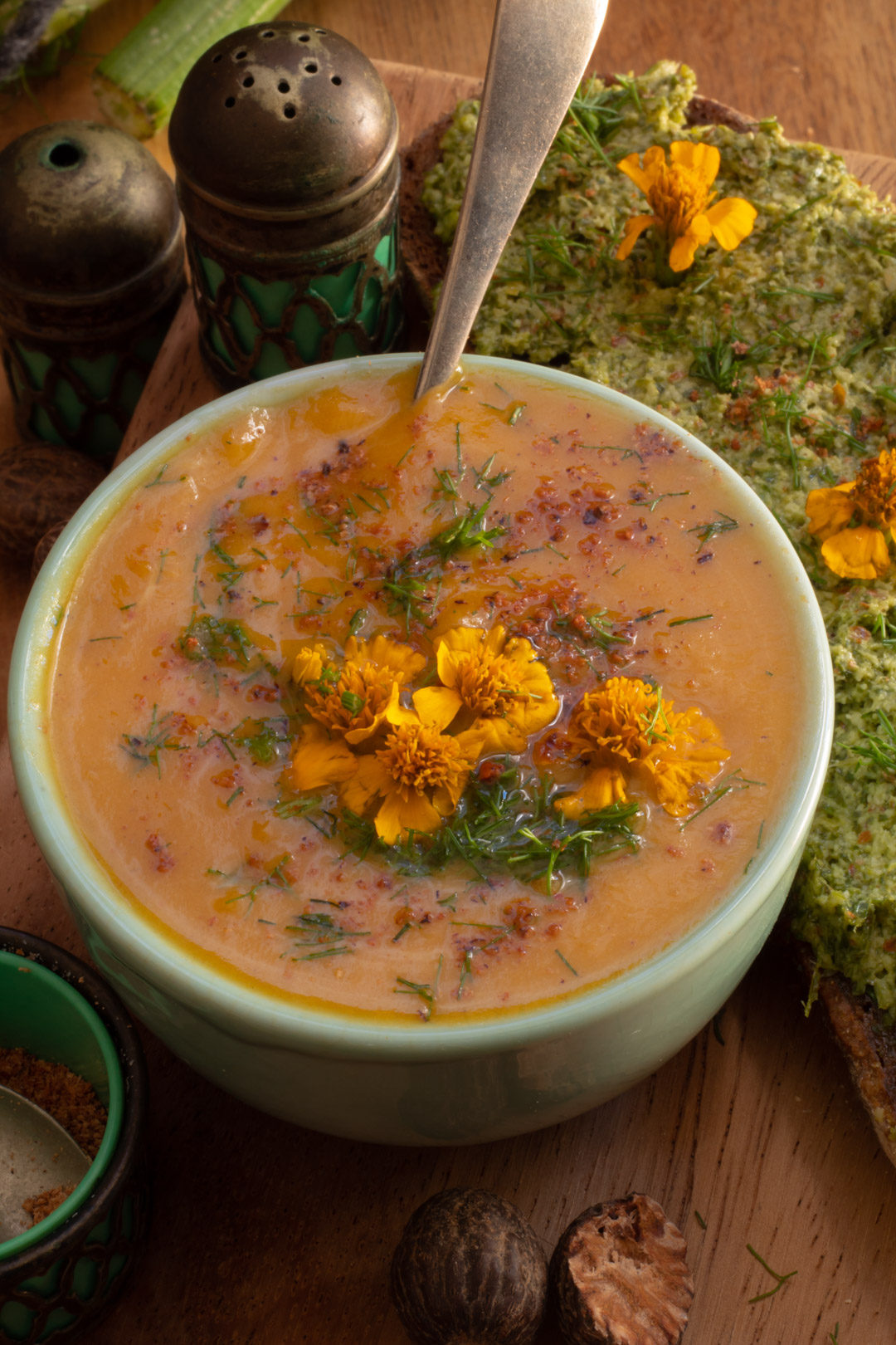 pumpkin and fennel soup with tarragon, fennel tops and nutmeg - close up
