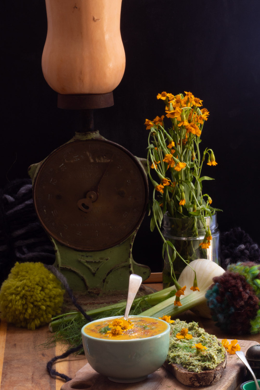 carrot and fennel soup with tarragon, fennel tops and nutmeg with antique kitchen scale