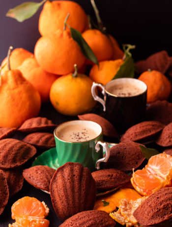 madeleines with mandarin, raw cacao and wattleseed served with wattleseed coffee and fresh mandarins