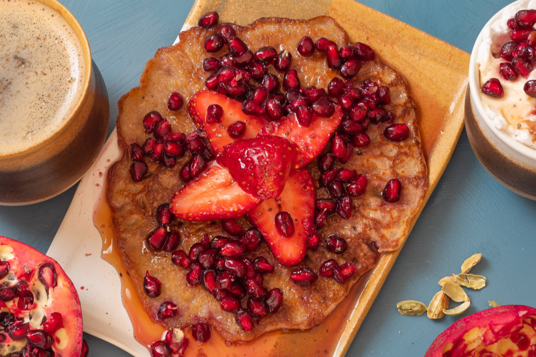 cinnamon, chia buckwheat pancakes with strawberry & pomegranate