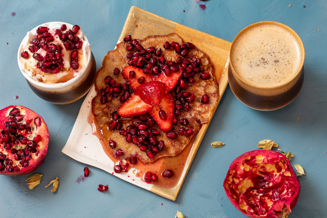 cinnamon, chia buckwheat pancakes with strawberry & pomegranate