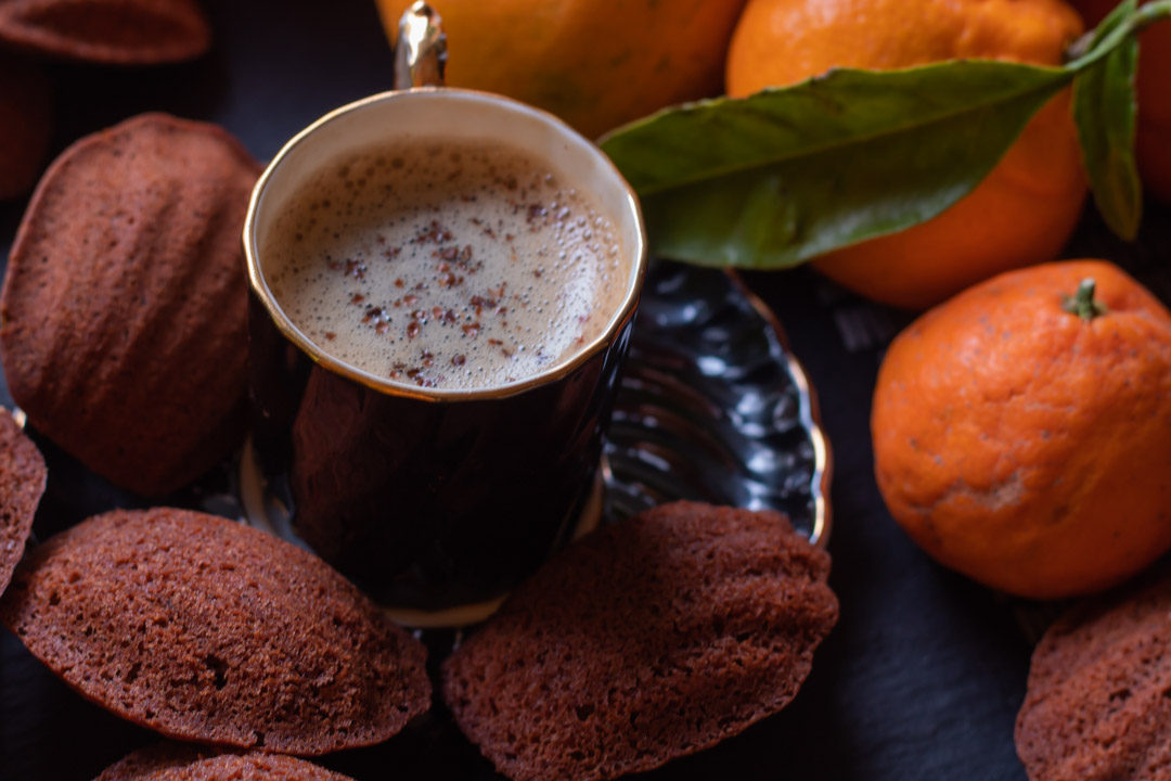 madeleines with mandarin, raw cacao and wattleseed black cup