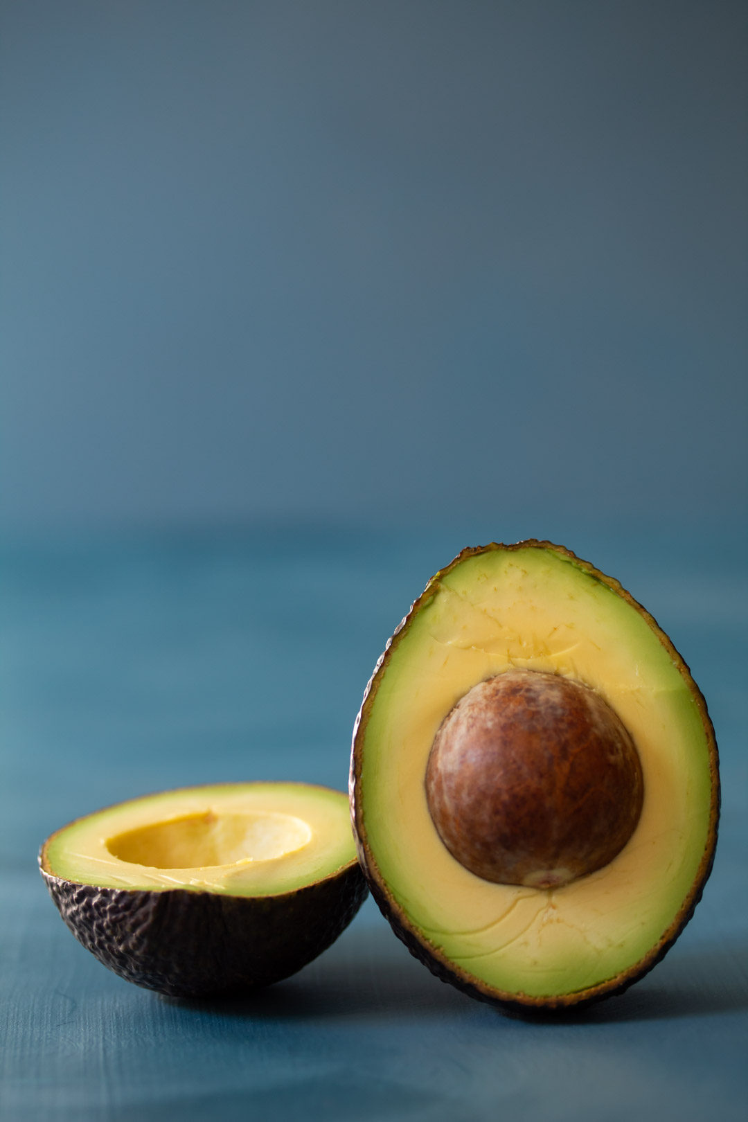 avocado still life halved