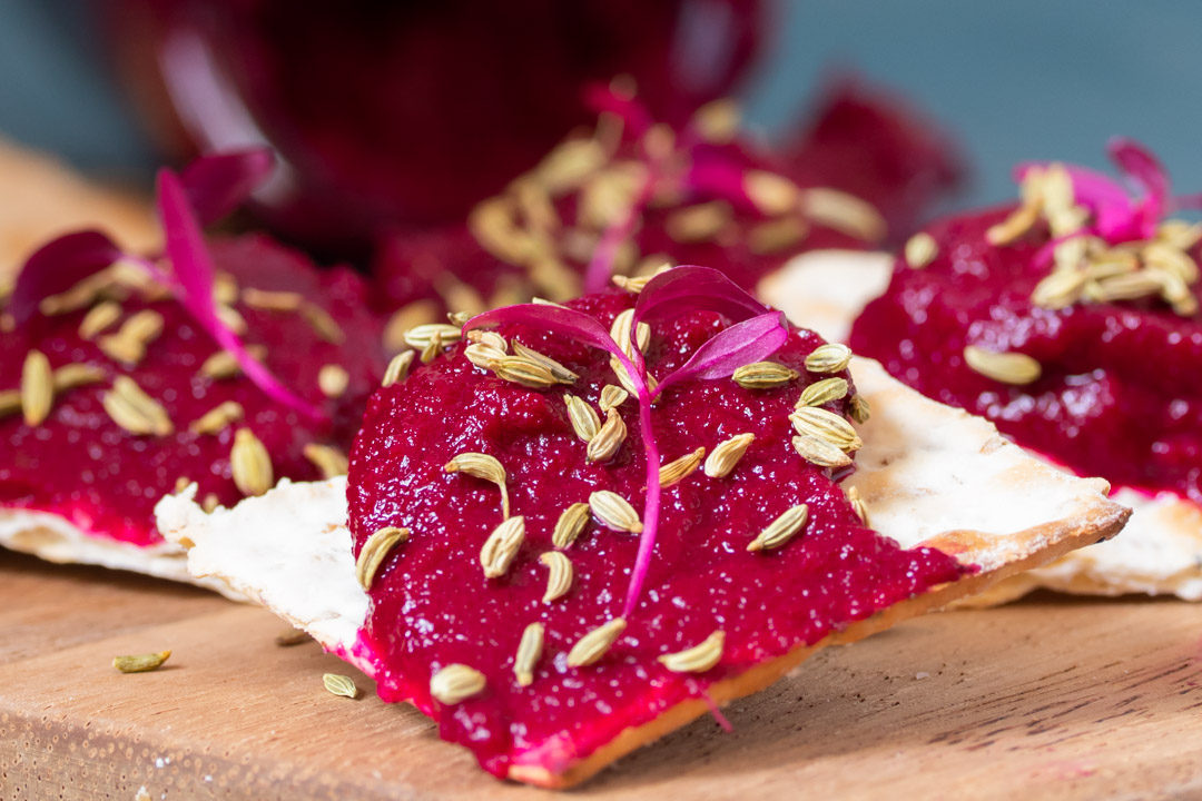 beetroot dip with jar in background