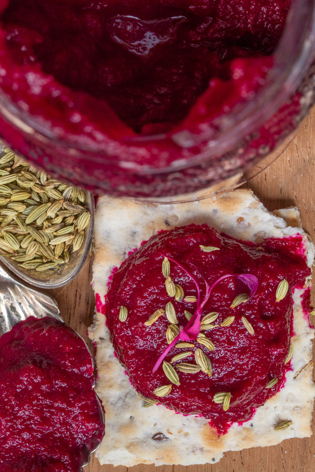 beetroot dip with jar and spoons from above