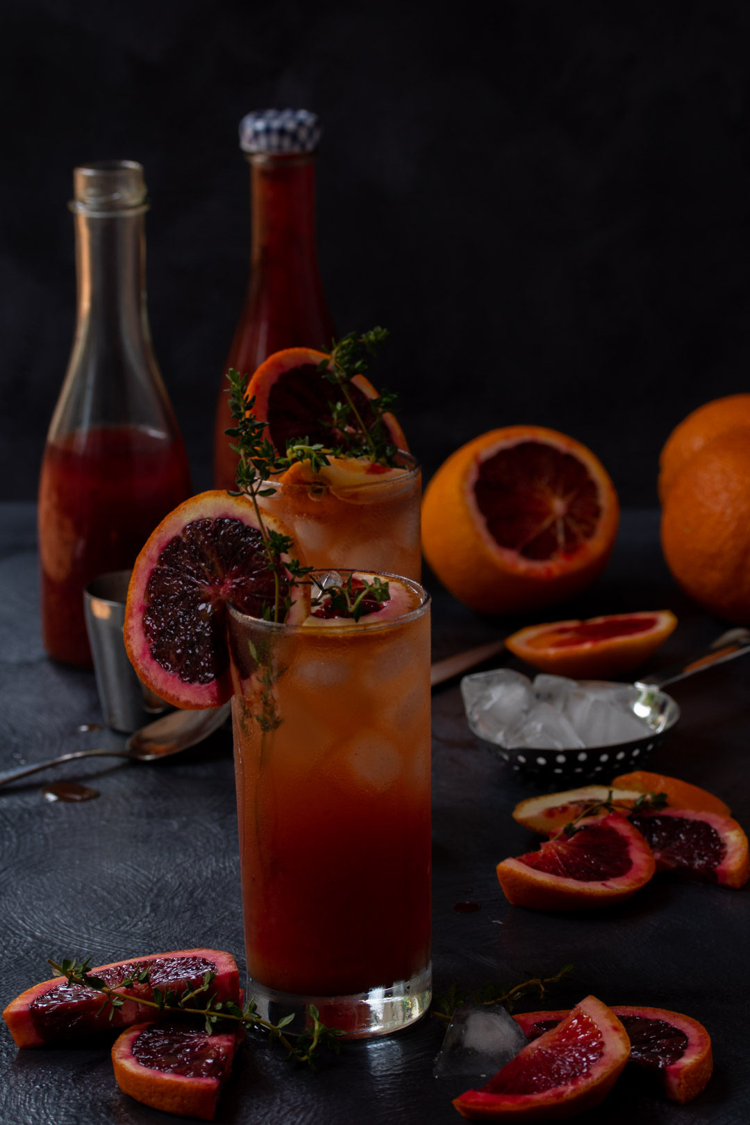 making blood orange and thyme spiced shrub