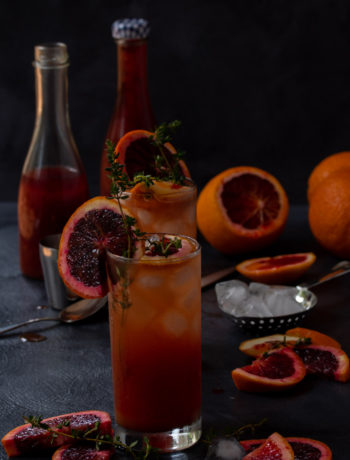 making blood orange and thyme spiced shrub