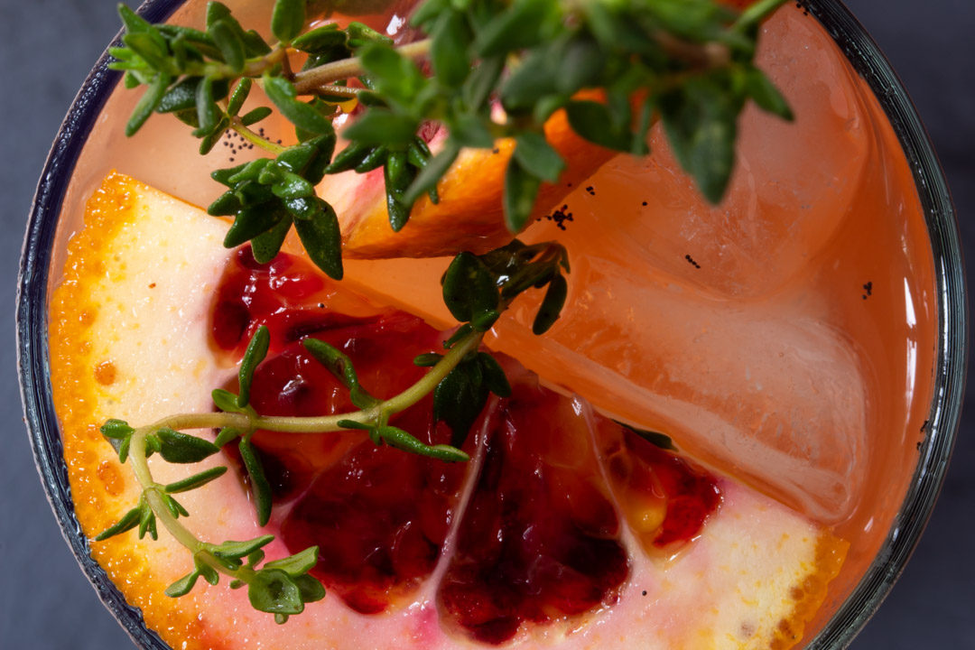 spiced blood orange and thyme shrub close up