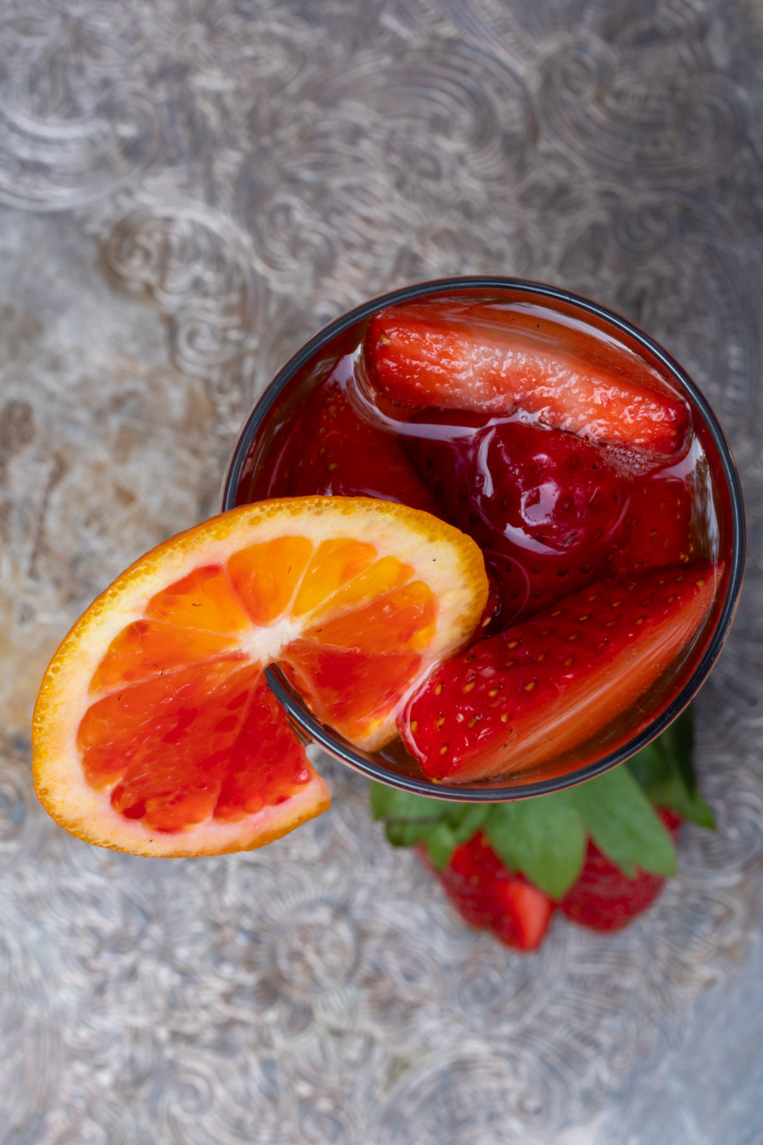 blood orange shrub and strawberry champagne cocktail