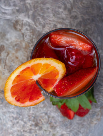 blood orange shrub and strawberry champagne cocktail