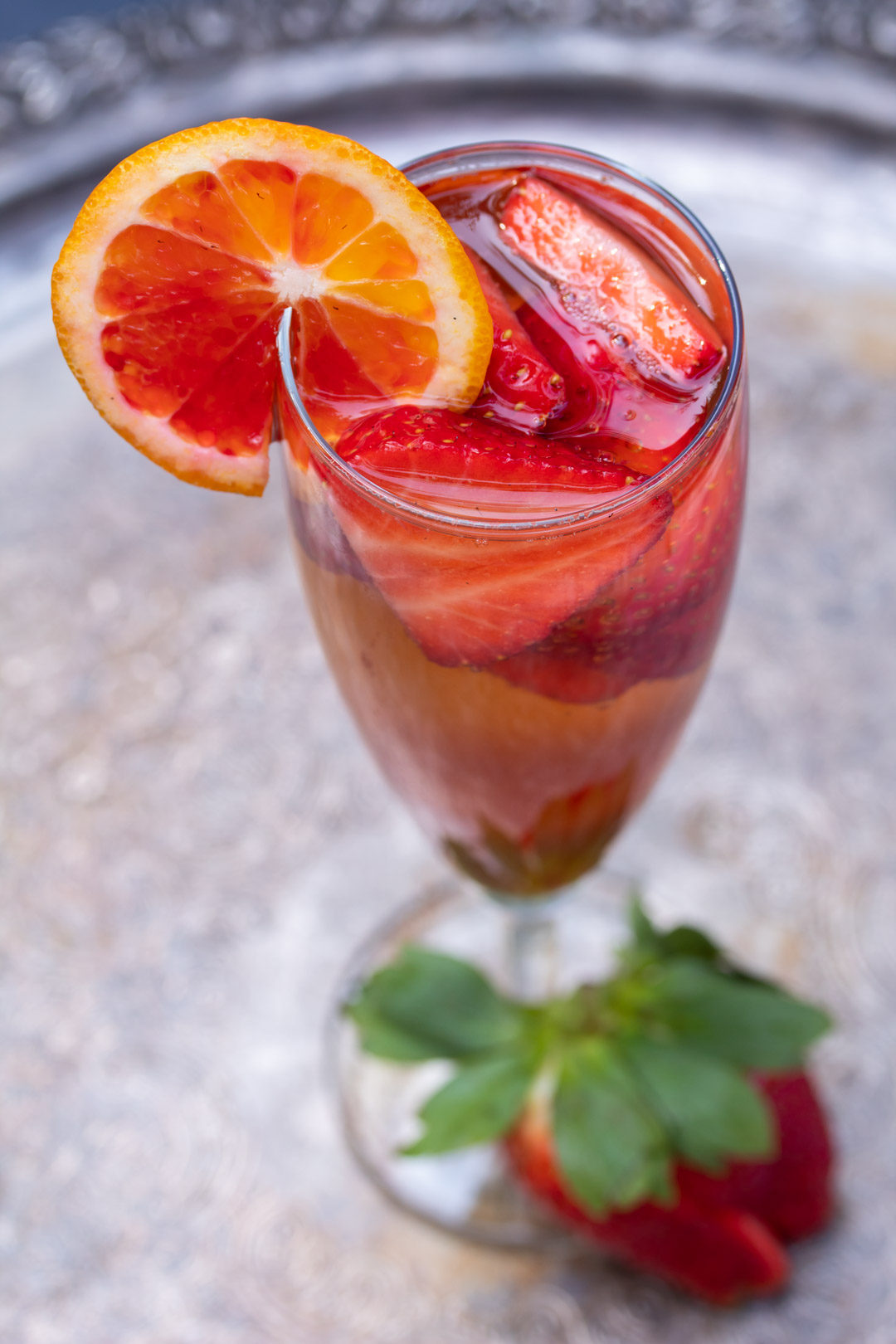blood orange shrub and strawberry champagne cocktail