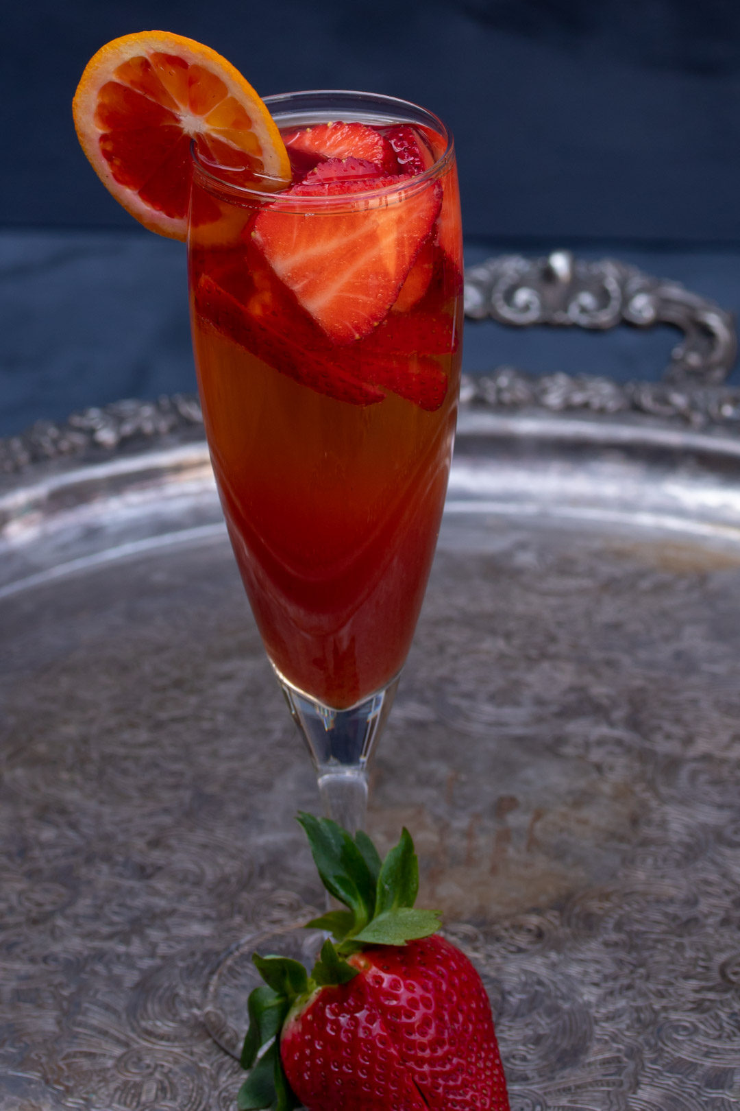 blood orange shrub and strawberry champagne cocktail