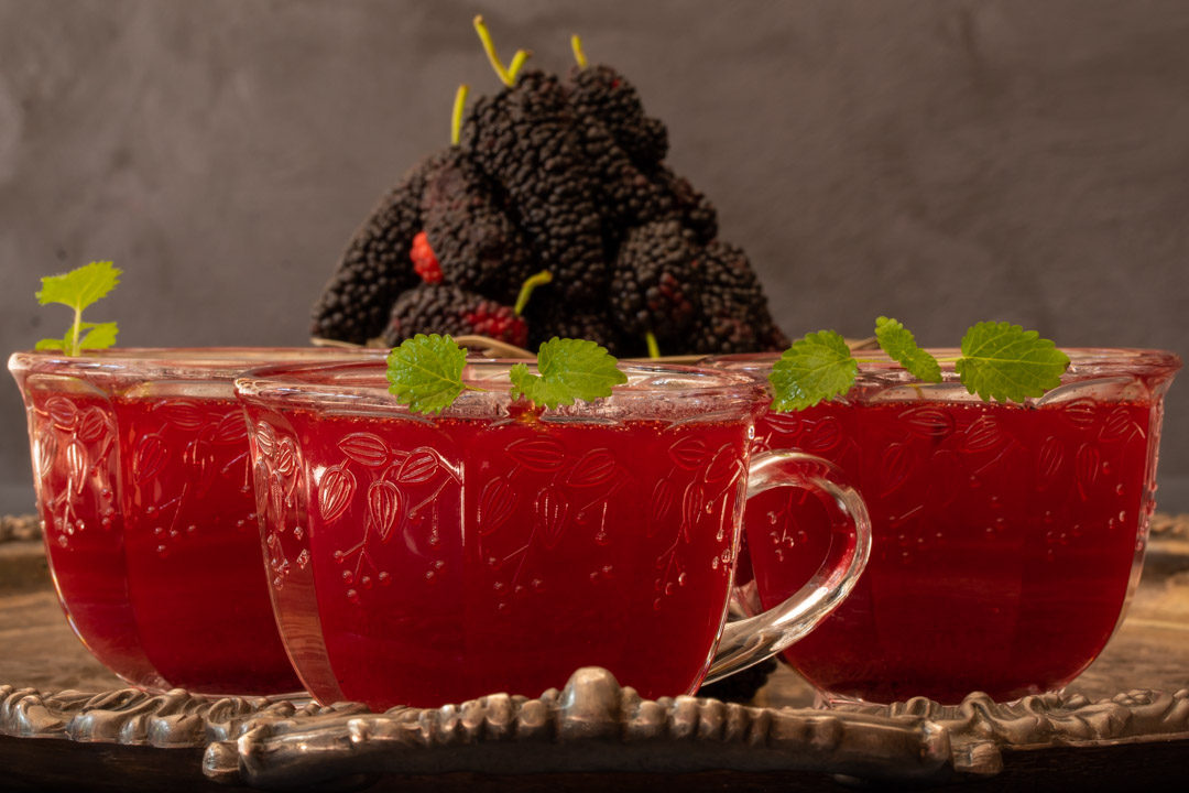 spiced mulberry shrub three glasses