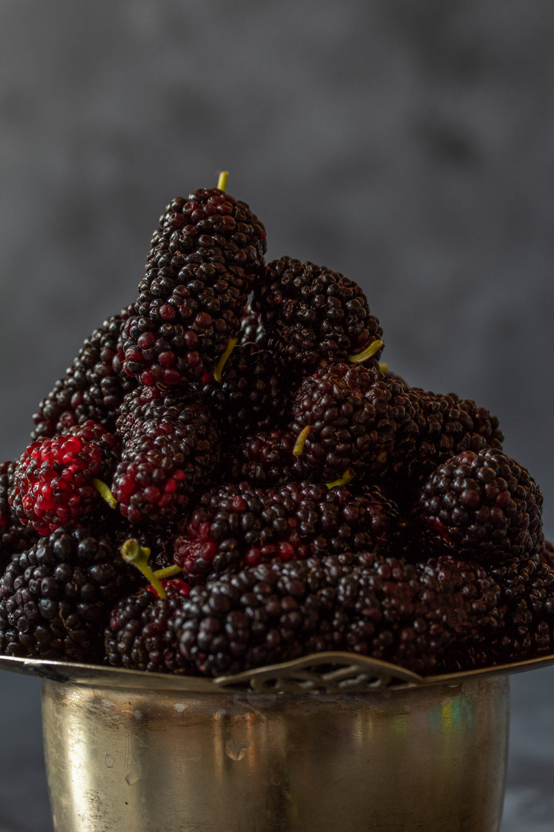 spiced mulberry shrub mulberries still life close up