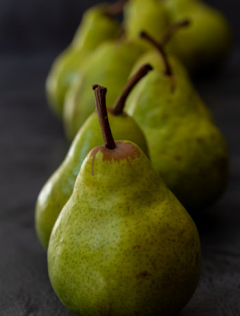 Pear pickles with cardamom & ginger: pears in line still life