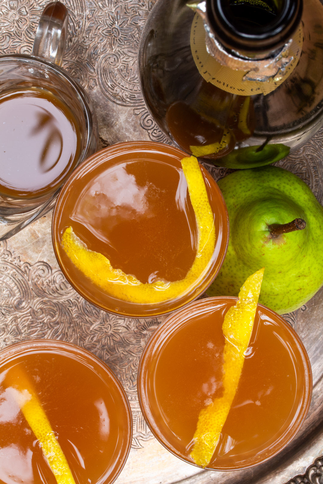 ginger pear champagne cocktail: from above with 3 glasses