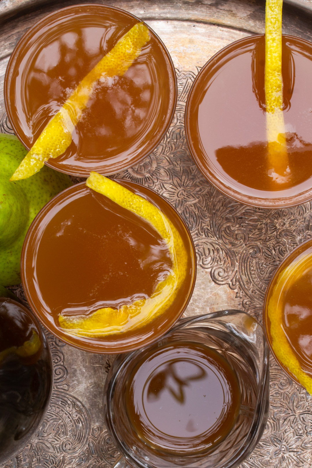 ginger pear champagne cocktail: from above with 4 glasses