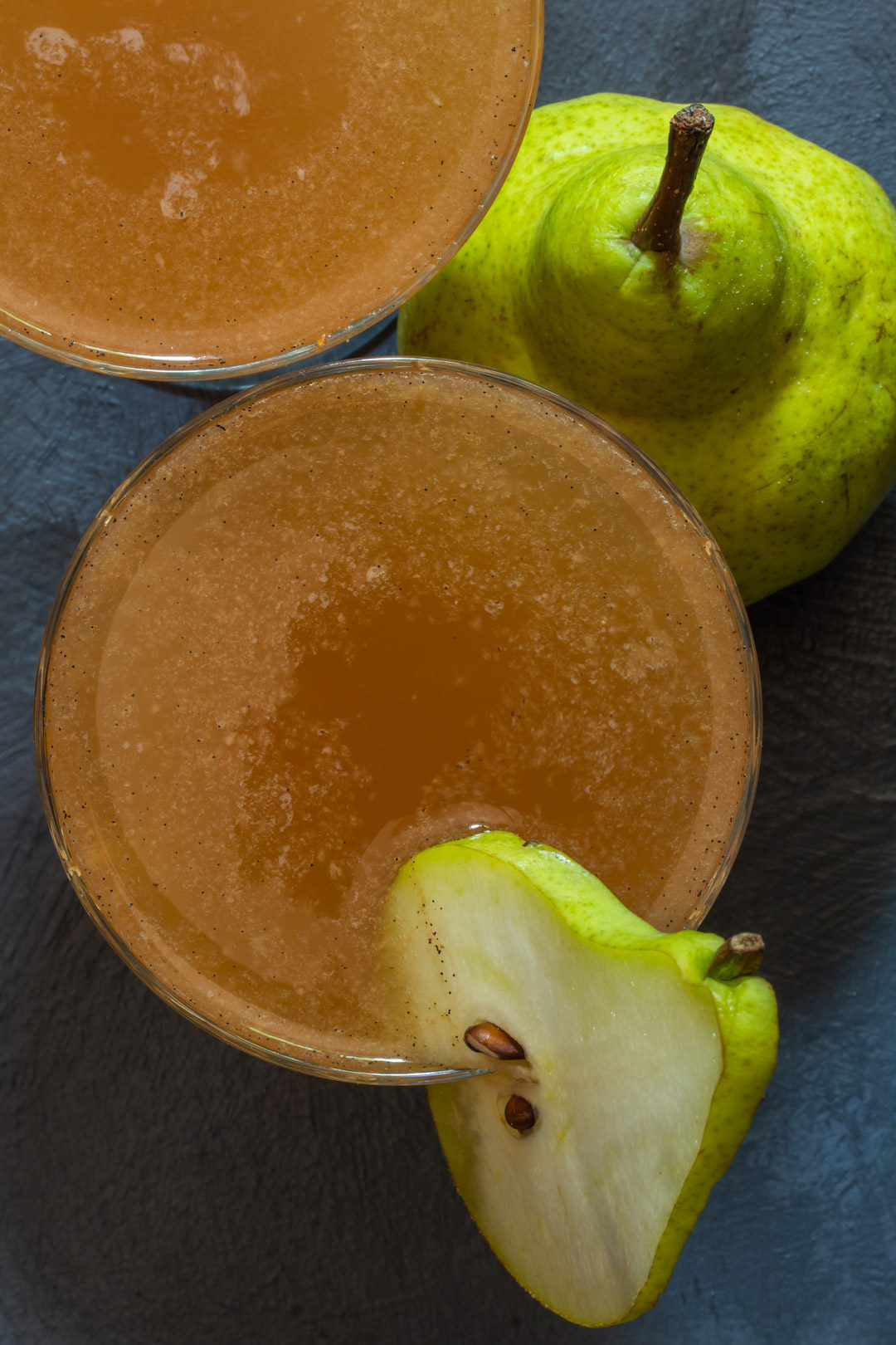 spiced ginger pear shrub: from above two glasses