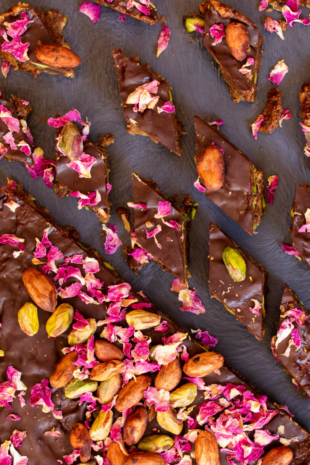 Spiced raw cacao halva with pistachios, ginger, cardamom and rose: cut round from above