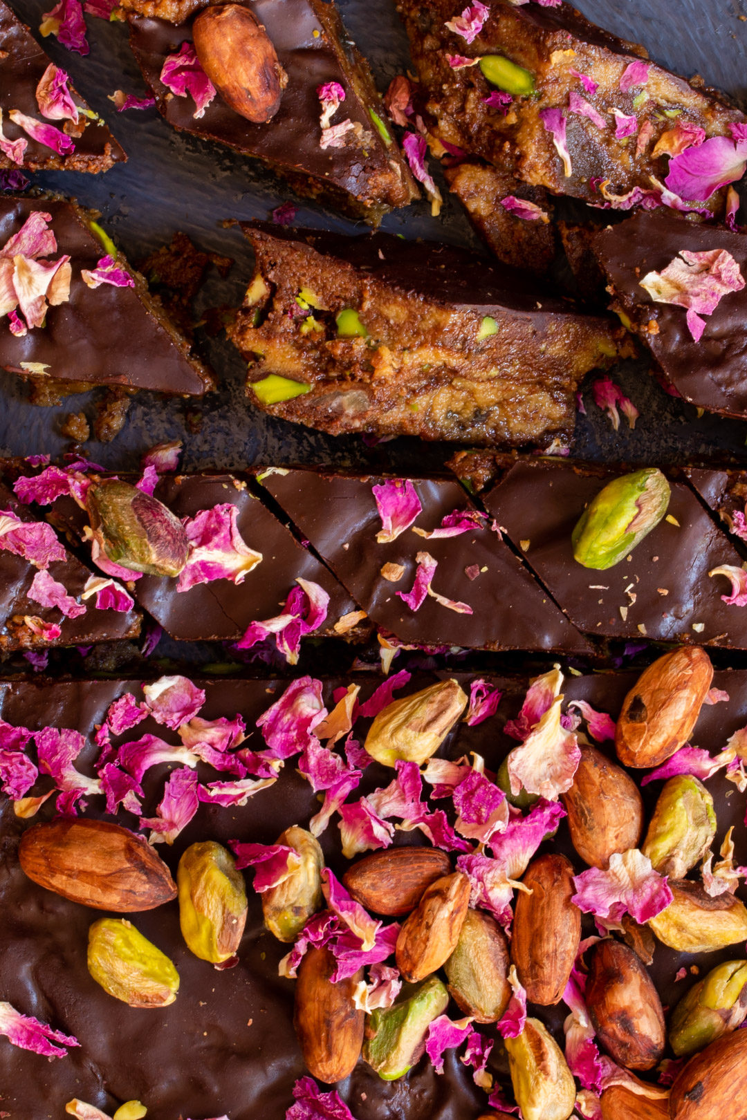 Spiced raw cacao halva with pistachios, ginger, cardamom and rose: cut round straight line