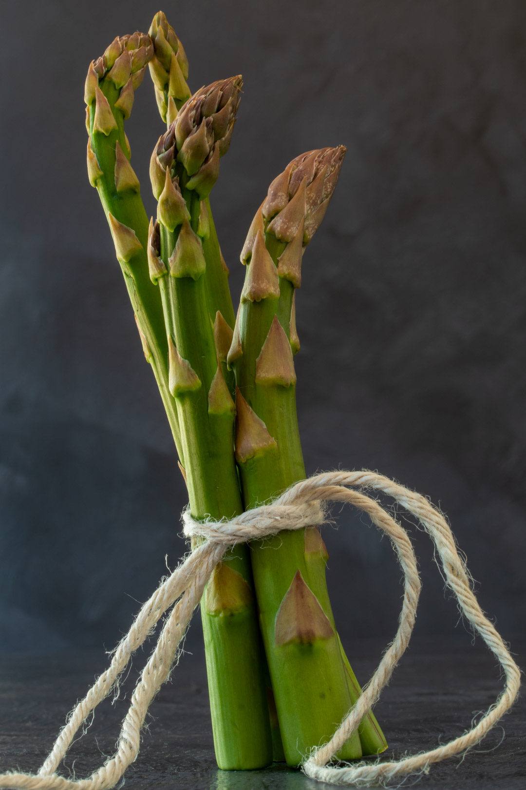 asparagus & lemon tart: asparagus still life with grey background