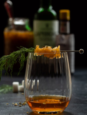 fennel pickle old fashioned cocktail: eye level making vertical