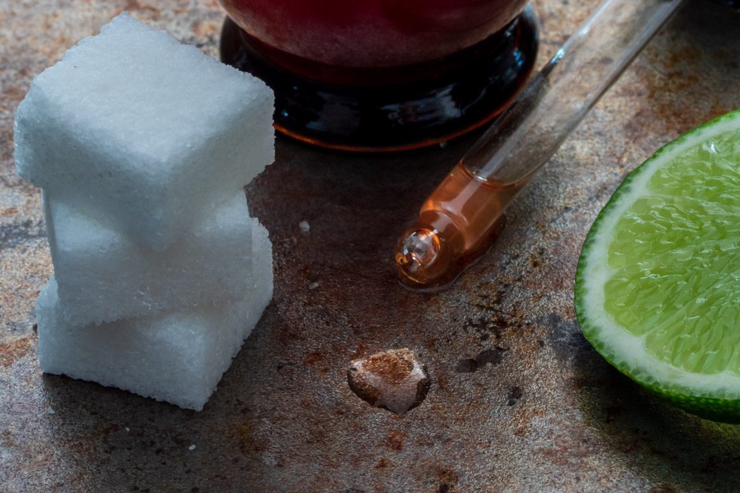 Rhubarb cacao bitters with wattle seed : close up