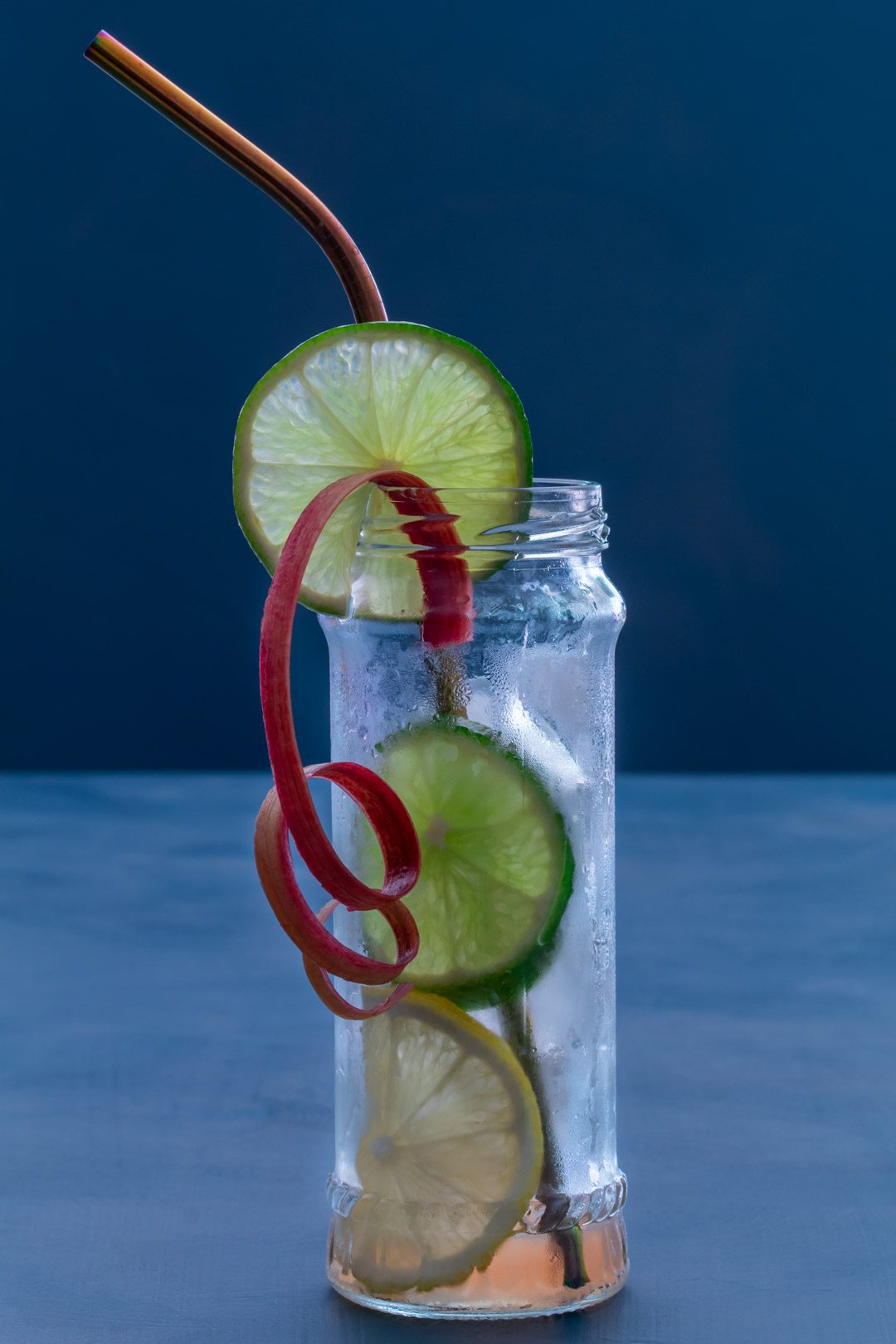 lemon lime and rhubarb bitters with straw left