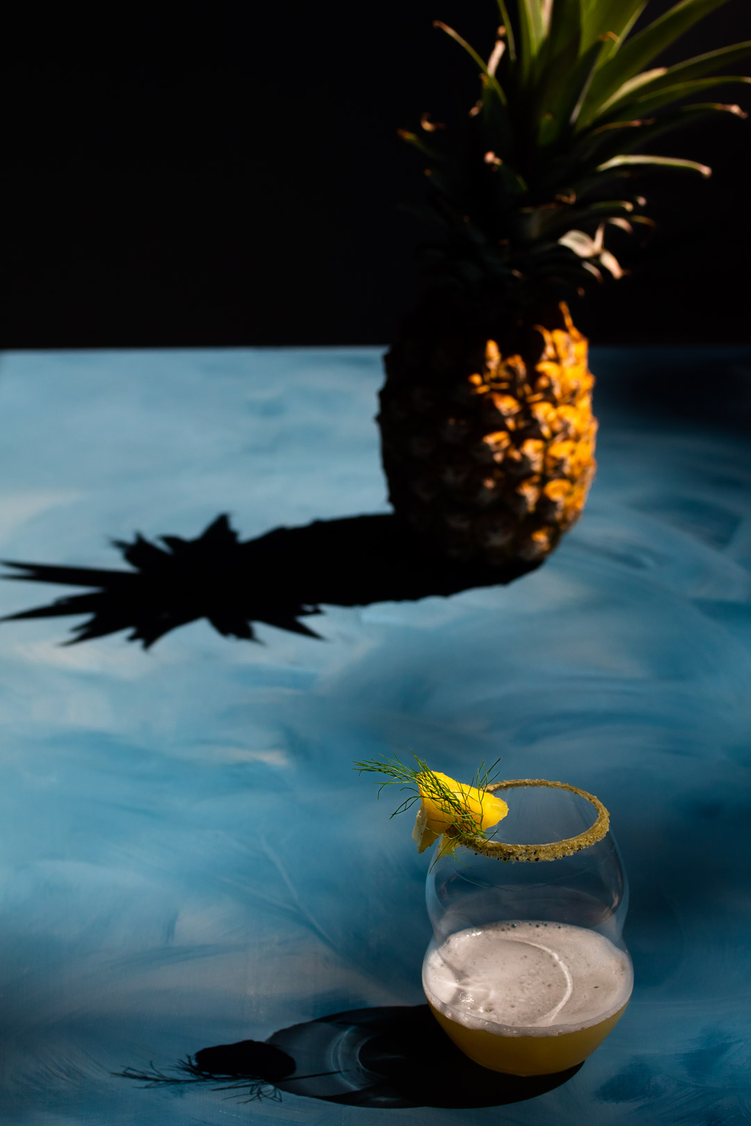 pineapple fennel shrub margarita cocktail with pineapple and shadow