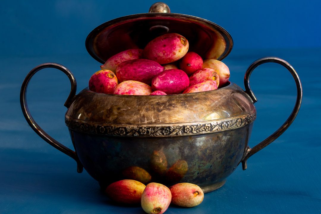 making pistachio rose water orgeat syrup with fresh pistachios in vintage sugar bowl with lid closed