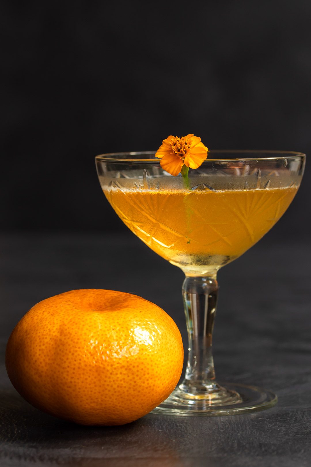 Mandarin pickle Hoop la! Cocktail with mandarin in foreground