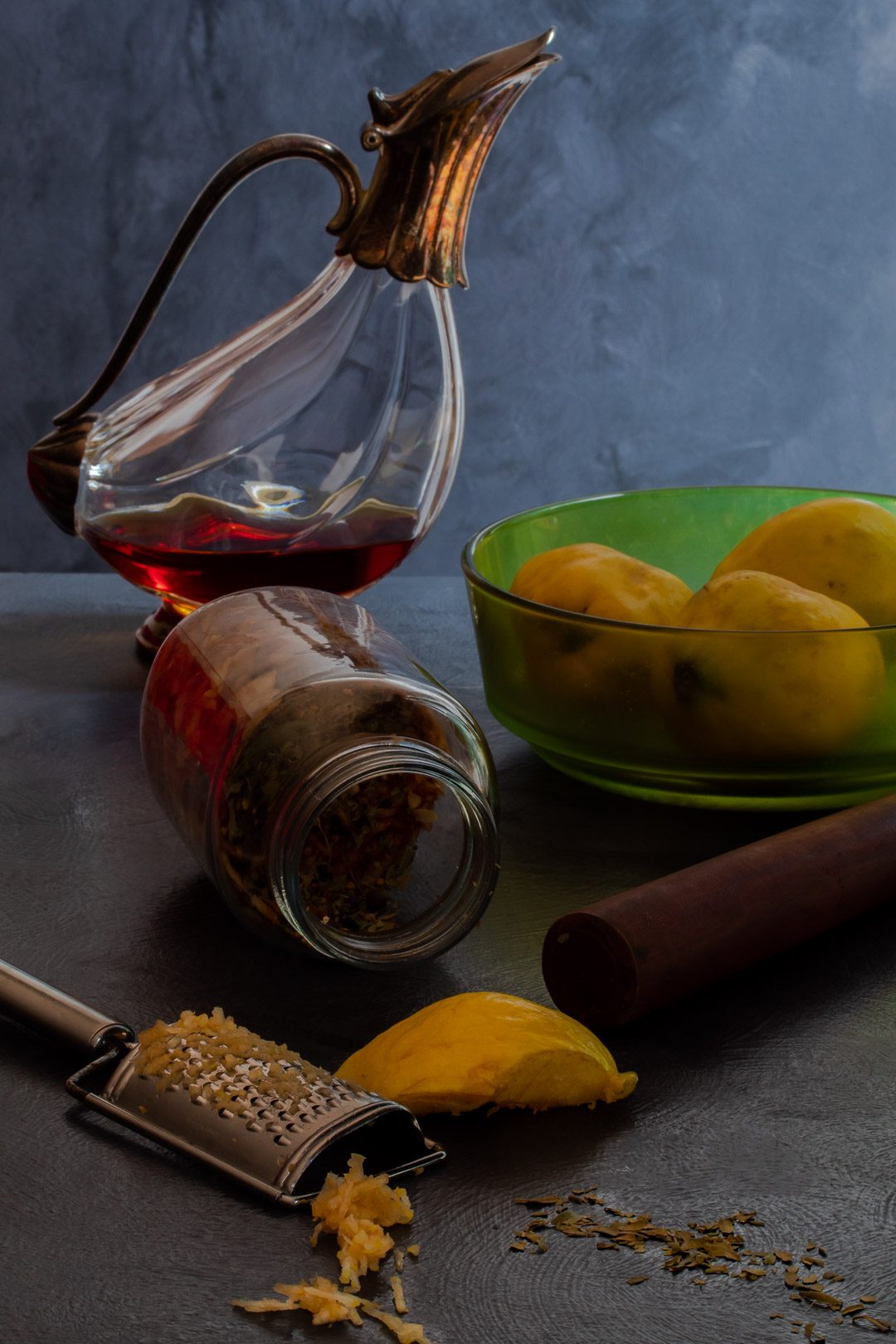 Making Vintage Quince Cordial grated quince in foreground