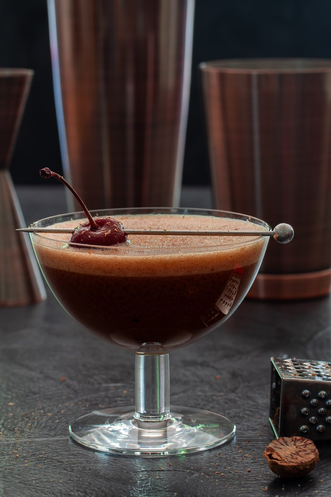 Pickled cherry chocolate sherry flip cocktail with Boston shakers