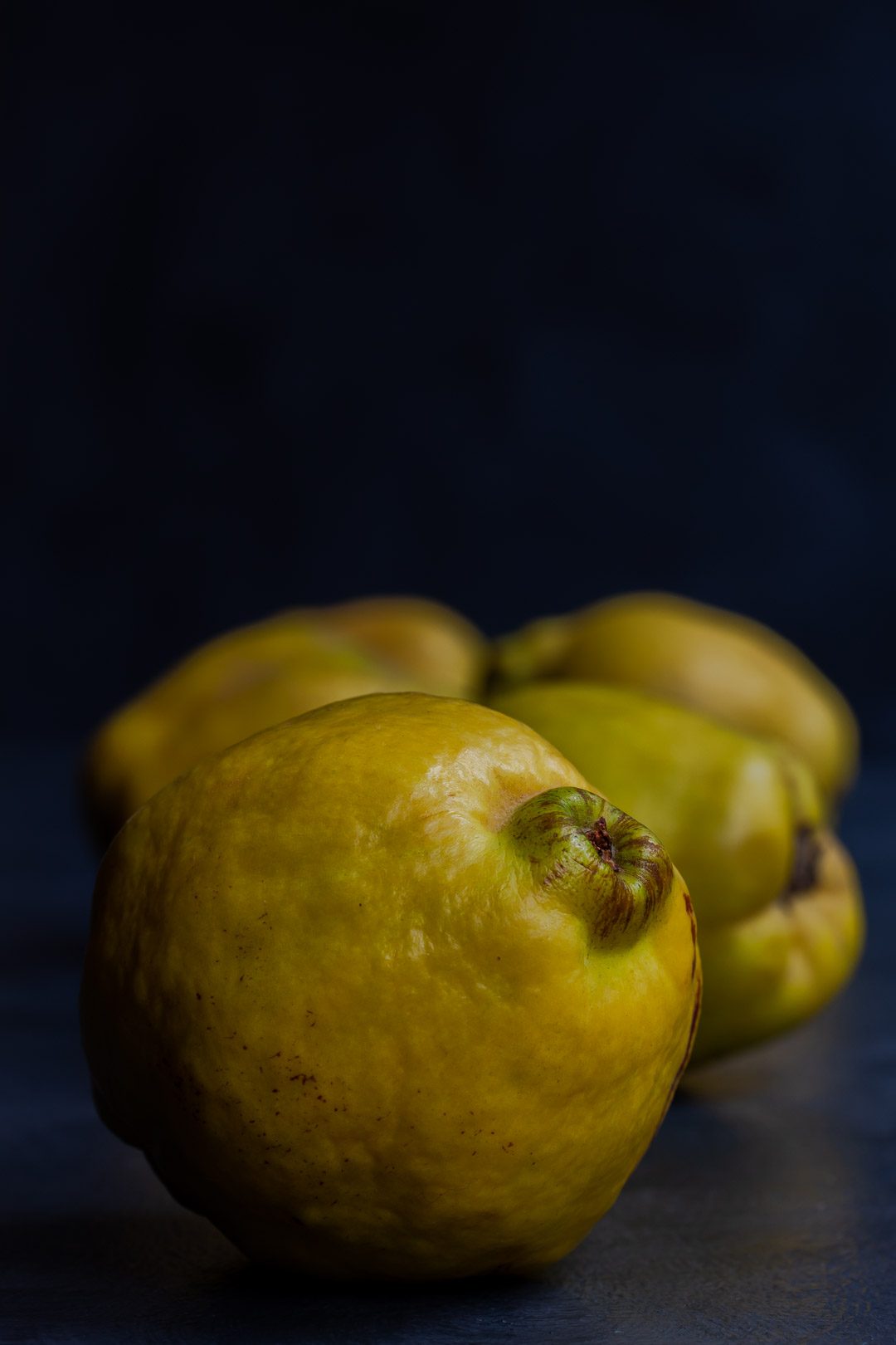 Making Vintage Quince Cordial with quinces in a row centred