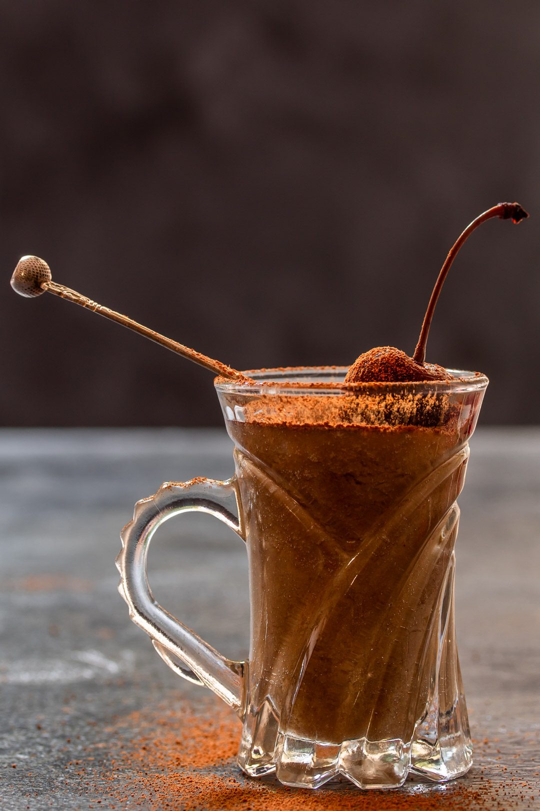 Spiced sherry ‘Sack’ posset solo with dusting of cinnamon sugar