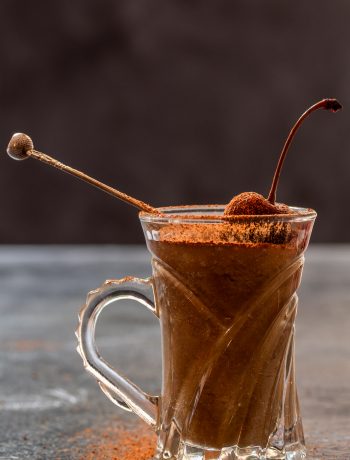 Spiced sherry ‘Sack’ posset solo with dusting of cinnamon sugar