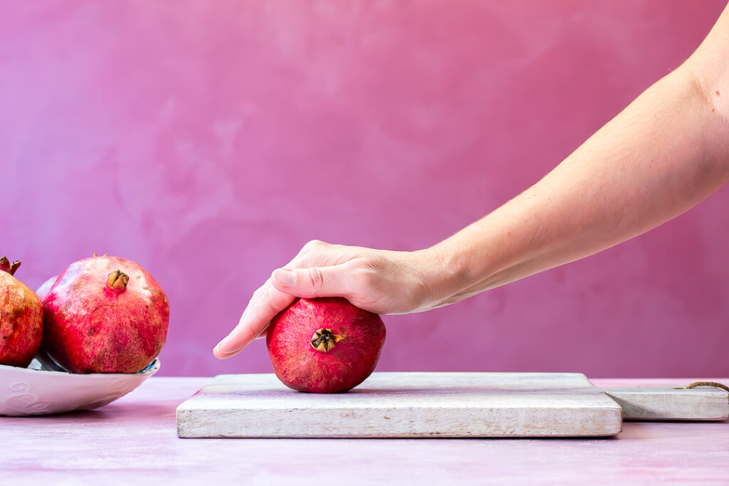 still more rolling a pomegranate for grenadine horizontal