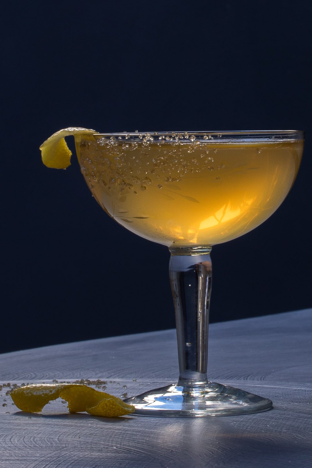 Fancy quince brandy champagne cocktail with tilt horizon