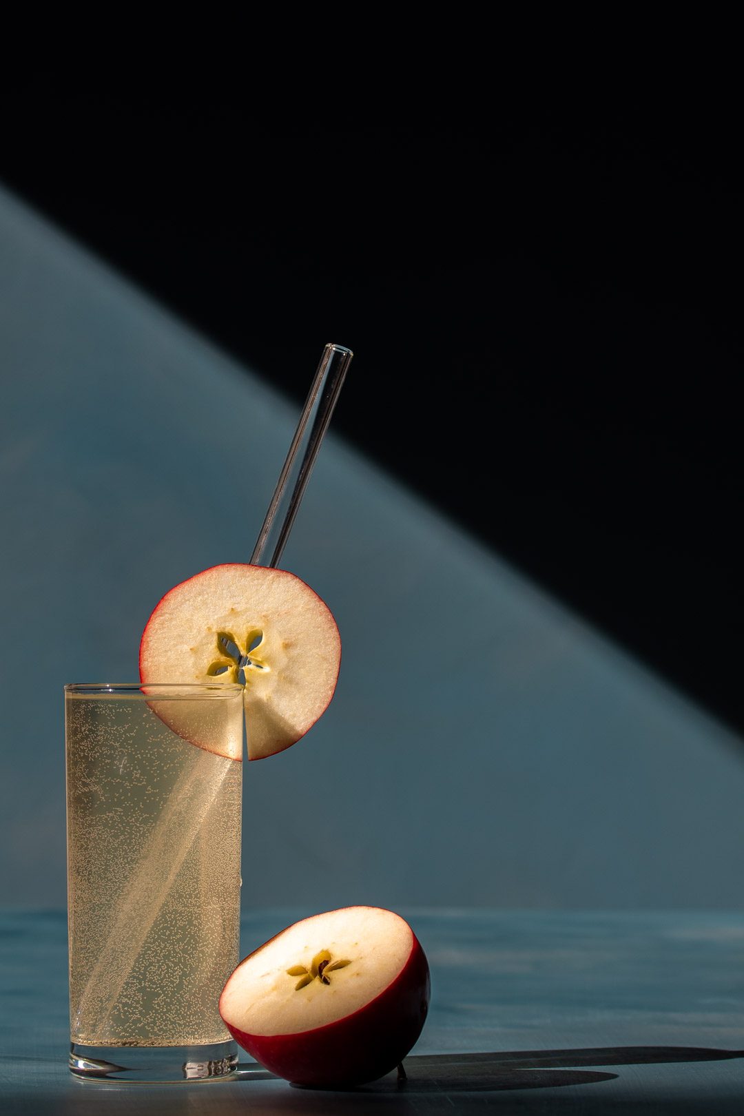 apple shrub gin fizz cocktail with shadows and lines