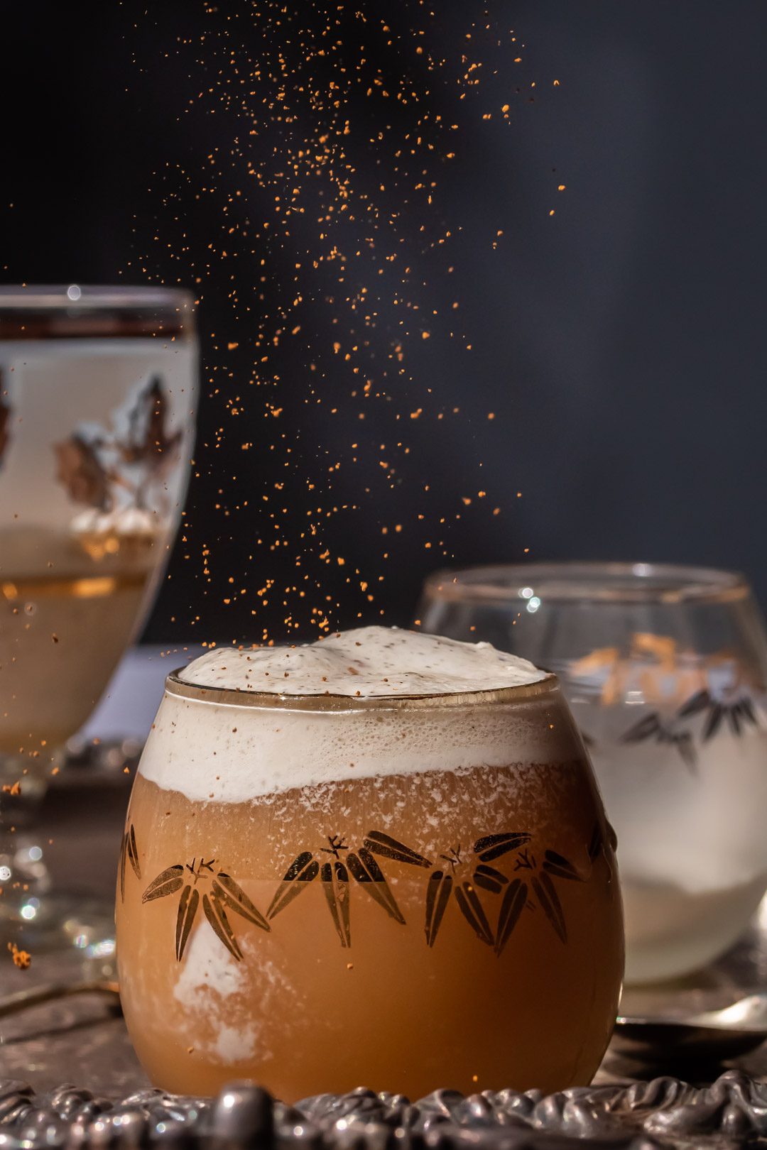 sprinkling cinnamon on lemon myrtle ginger beer spiders