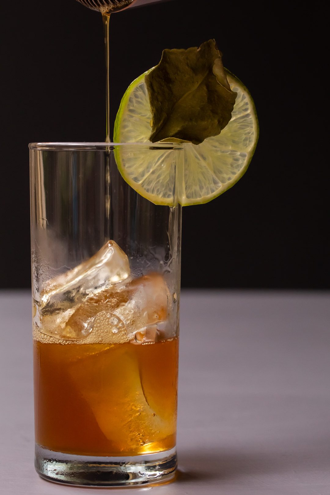 lime lightening dark 'n stormy finish pouring rum and lime