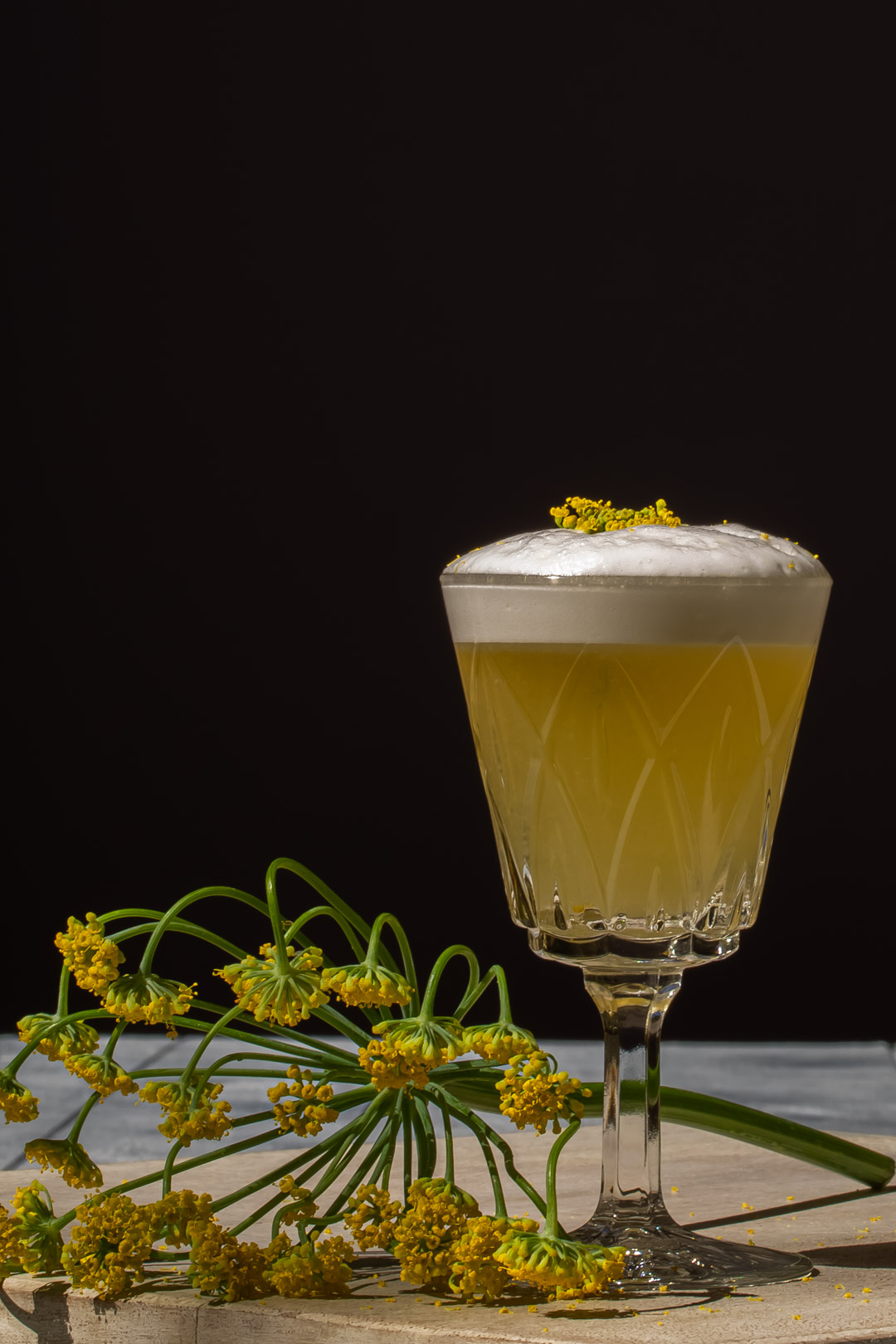 fennel flower silver sour to right with fennel umbrel and fennel flower garnish