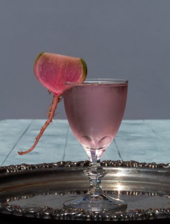 fermented watermelon radish martini on vintage silver tray