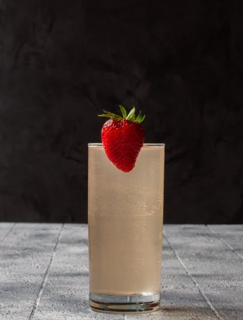 strawberry fiz with strawberry garnish