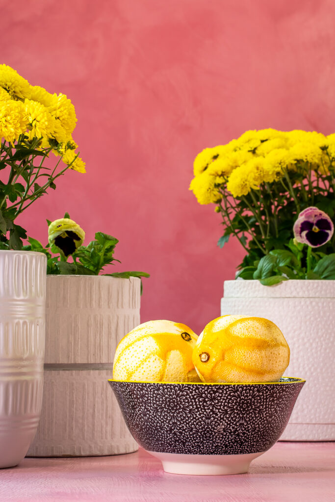 peeled lemons and orange for oleo saccharum shrub for fancy honey bee cocktail